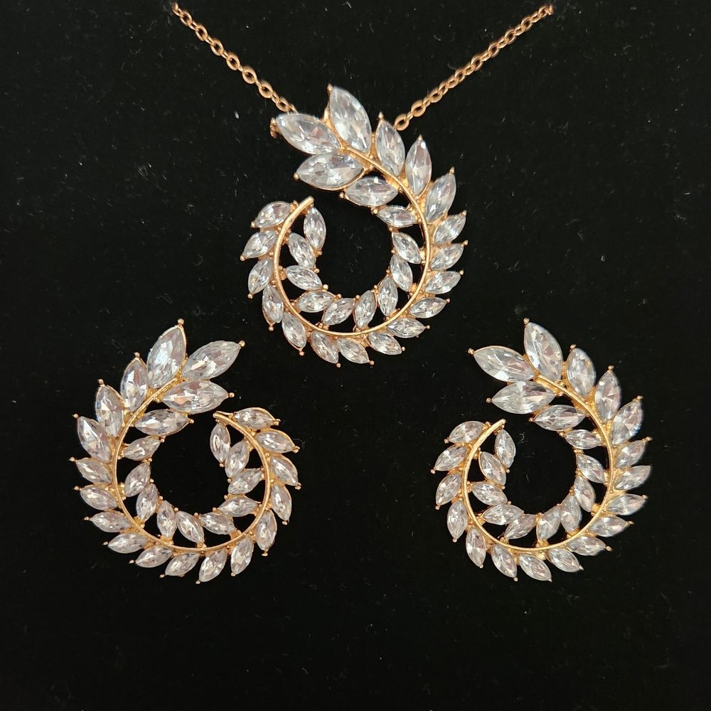 Gold Tone And White Crystal Leaf Pattern Necklace And Earring Set